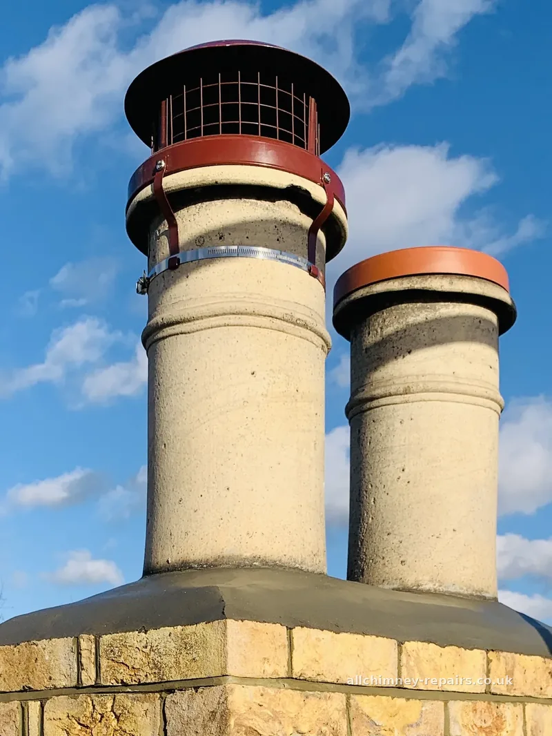 Chimney repair specialist — buff chimney pots fitted with solid fuel bird guard cowls and C-Cap push-in vented cap, new flaunching and top brickwork reinstated, Harold Wood | Allchimney Repairs