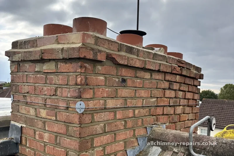 Chimney repair specialist — chimney repointing and brick repairs complete, cappings fitted to pots on completion, Romford | Allchimney Repairs