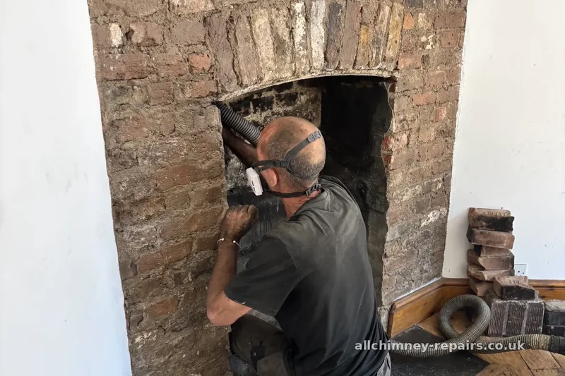 HETAS registered chimney lining — internal brick gather cleaned and inspected prior to 200mm solid fuel liner installation, wood basket open fire, Romford | Allchimney Repairs