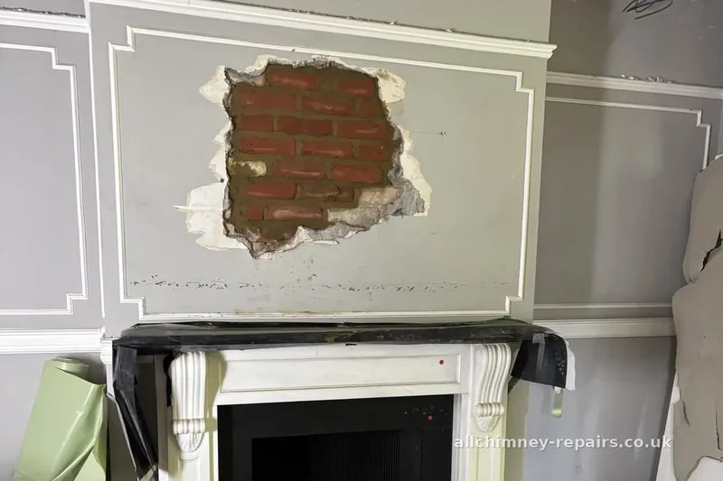 HETAS registered chimney lining — stainless steel gather hood installed at brick gather, 200mm solid fuel open fire relining, Building Regs compliant, Upminster | Allchimney Repairs