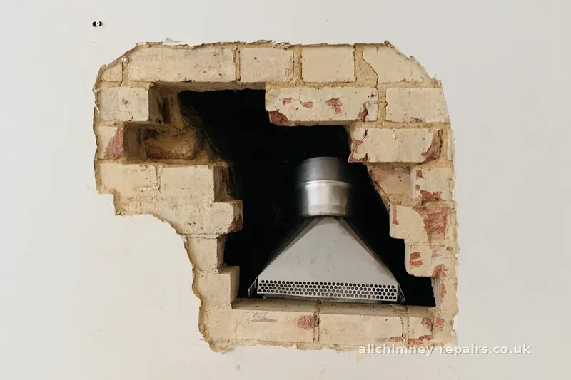 HETAS registered chimney lining — gather hood inserted at brick gather above GFE gas open fire, 180mm minimum diameter lining, Building Regs Part J compliant, Romford | Allchimney Repairs